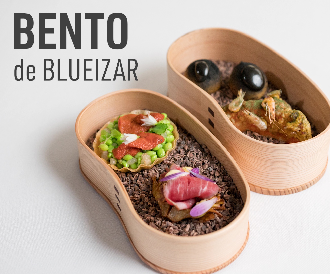 Apenas con un año de haber abierto el local, BLUEIZAR se ha colocado en el número 1 de Trip Advisor en Bilbao. La cocina de Bruno no solo es estética, sino deliciosa y sabrosa. Está basada en su memo-ria culinaria, cultivada en cada lugar en el que ha dejado su huella y los ingredientes de cada tempora-da. Bruno nos sorprende con su versión de Bento con productos locales y un toque japonés.